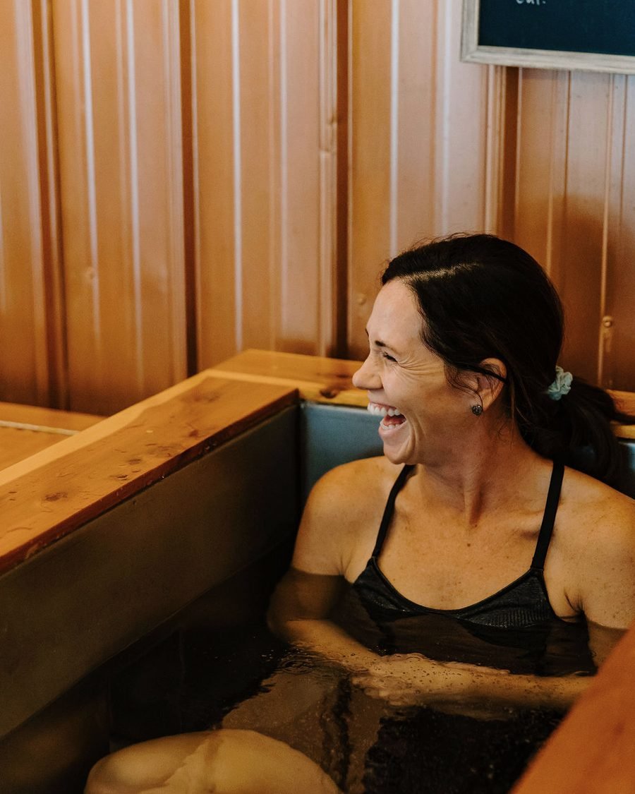 A member laughing in the NUMA cold plunge